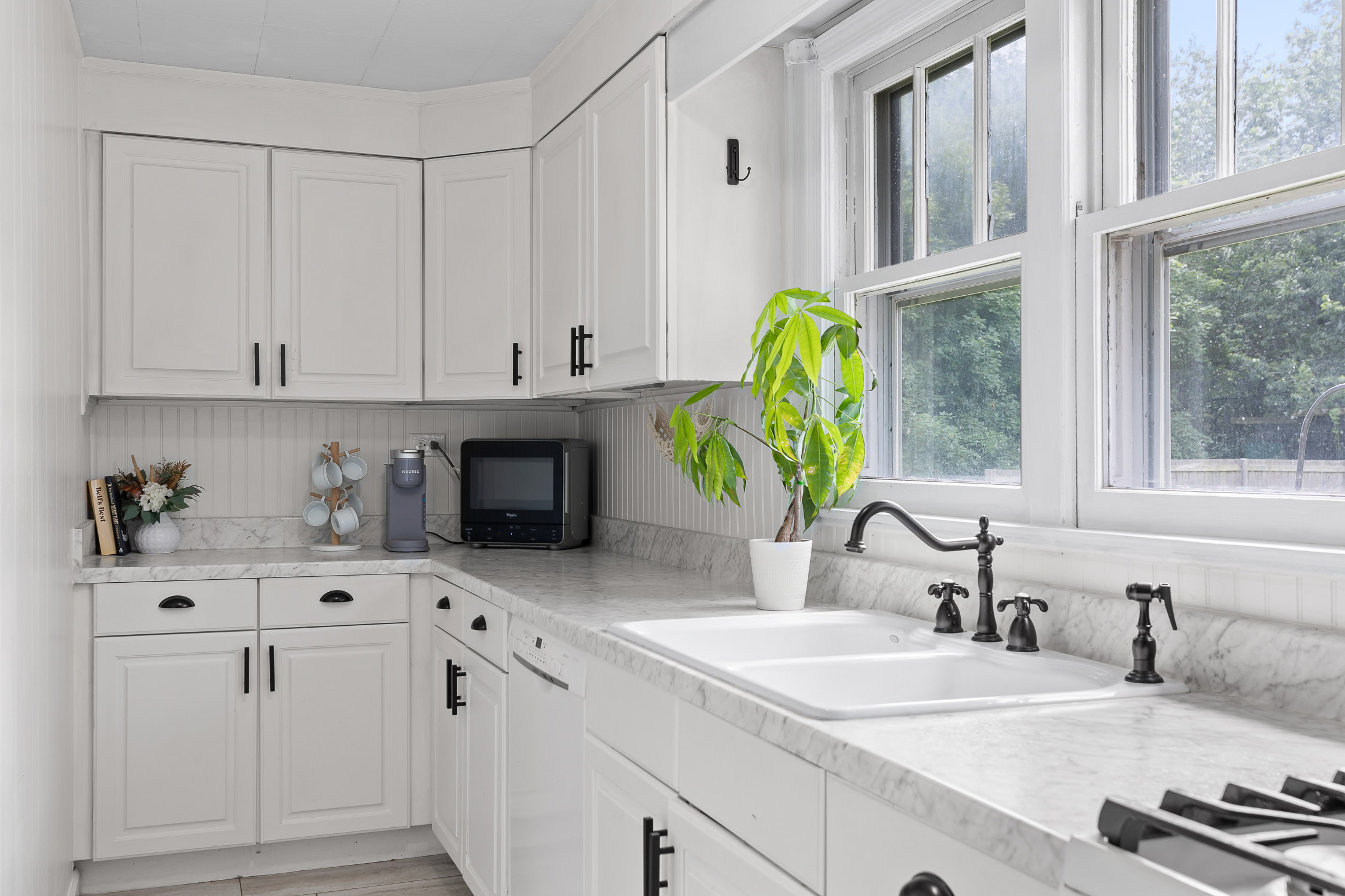 Kitchen with white cabinets